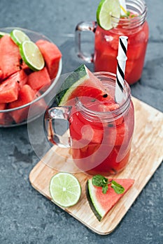 Watermelon smoothie and chips with lime