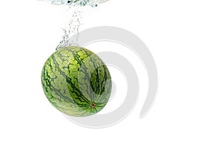 Watermelon splash and sinking isolated against white