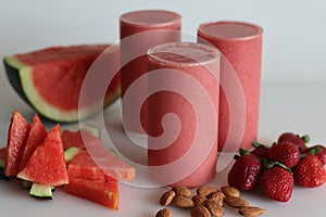 Watermelon strawberry smoothie. Summer drink made of watermelon and fresh strawberries in almond milk