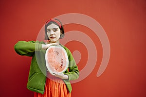 Watermelon Ñ„Ñ‚Ð² Girl in red and green looking to the camera