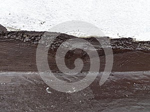Waterproof coatings applied on flat roof concrete surfaces.
