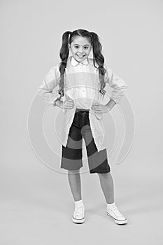 Waterproof concept. Small schoolgirl wear water resistant clothes. Cute schoolgirl feel protected. Happy schoolgirl wear