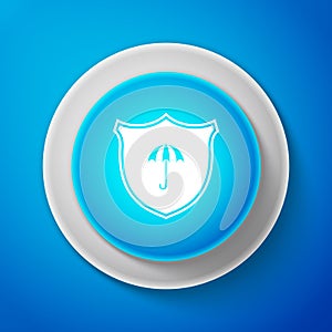 Waterproof icon isolated on blue background. Shield and umbrella. Water protection sign. Water resistant symbol. Circle