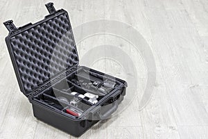 Waterproof plastic case with photo equipment inside