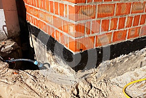 Waterproofing foundation bitumen. Foundation Waterproofing, Damp proofing Coatings. Waterproofing house foundation with spray on