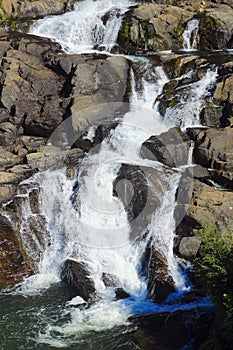 Arctic River cascading over Canadian Shield at Cameron Falls, Hidden Lake Territorial Park, Northwest Territories, Canada photo