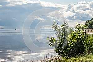 Waters landscape with blue sky and clouds