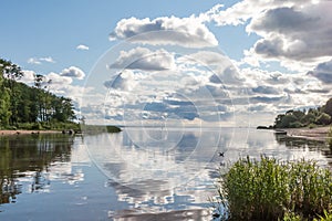 Waters landscape with blue sky and clouds