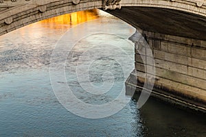Waters under ancient bridge