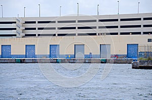 Waterside loading dock docks with breakwall photo