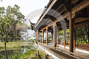 Waterside long colonnade in Duojing garden photo