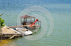 Waterslide on river shore