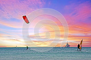 Watersports at Palm Beach on Aruba in the Caribbean Sea at sunset