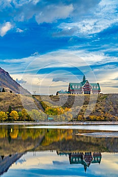 Waterton Lakes National Park lakeshore in autumn foliage season morning.