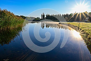 Watertrap on golfcourse early morning in Sweden