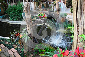 Waterwheel and pond in relax garden