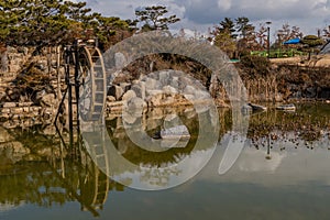 Waterwheel in small pond