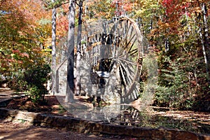 Waterwheel in the woods photo