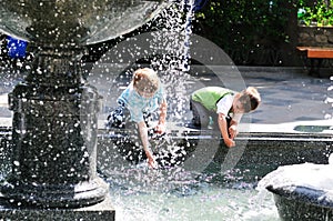 Waterworks play of boys photo