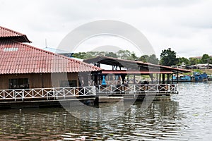 Watery parking lot - boat and restaurant floating Yarinacocha lake, Pucallpa