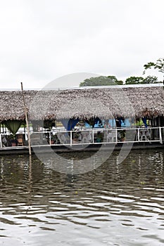 Watery parking lot - boat and restaurant floating Yarinacocha lake, Pucallpa, Ucayali, Lima,