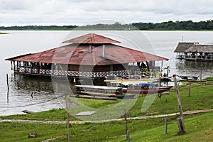Watery parking lot - boat and restaurant floating Yarinacocha lake, Pucallpa, Ucayali, Lima, Peru