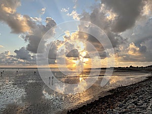 Wattenmeer, mud tideland in North Sea, Germany on sunset. Nordsee, Watt.