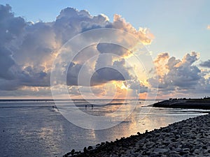 Wattenmeer, mud tideland in North Sea, Germany on sunset. Nordsee, Watt.