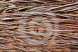 Wattle - a wicker fence of twigs, branches. Background texture natural