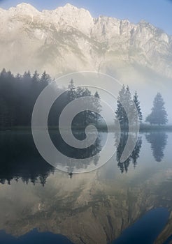 Watzmann east wall in the morning mist in Germany