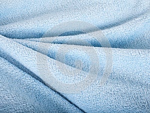 Wave background of blue fur texture.