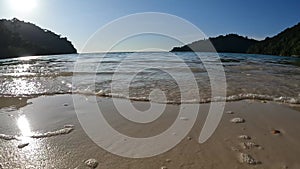 Wave and beach in Mu Ko Surin national park, Phang-Nga, Thailand.