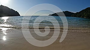 Wave and beach in Mu Ko Surin national park, Phang-Nga, Thailand.