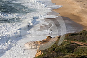 Wave on the beach of Nazare Portugal