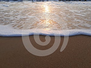 wave on the beach, sunset on the beach, beautiful sunset view in the Indian Ocean, sunset view in the goa,