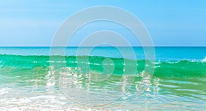 Wave on beautiful summer beach and tropical sea