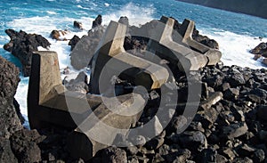 Wave Breakers Against Hawaiian Ocean