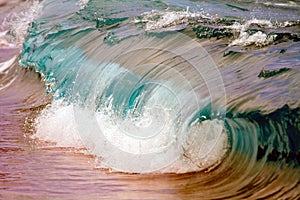 Wave breaking on shoreline.