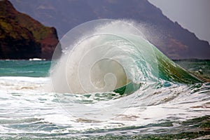 Wave breaking on shoreline.
