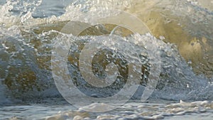 Wave and bubble in slow motion