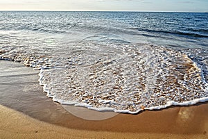 Wave of Caribbean beach photo