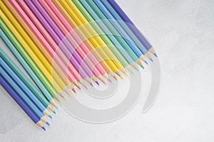 Wave of colored pencils,Top view rainbow pencils on white background, Illustration, Background concept, Education concept