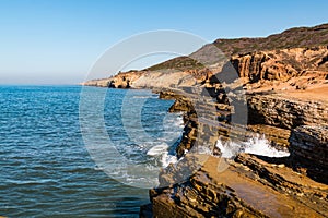 Wave Crashes on Eroded Cliffs at Point Loma Tidepools