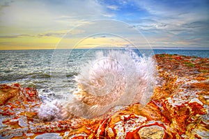 Wave crashing at Nightcliff, NT, Australia