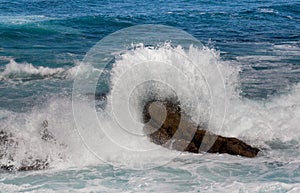 Wave crashing on the rock