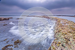 Wave flow ocean cloud dramatic