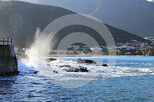 Wave hit the rocks near to the greek village Kiparissi Lakonia, Peloponnese during summer holidays.