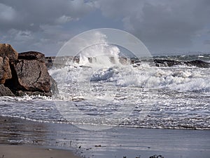 Wave hits coast of Galway bay during a storm