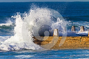 Wave Hitting Beach Tidal Pool