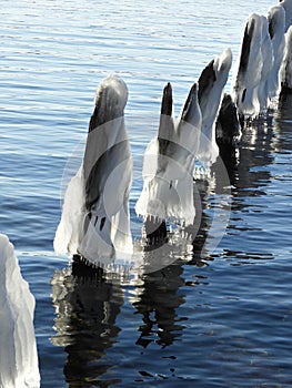 Wave Ice formed on Cayuga lake old piers